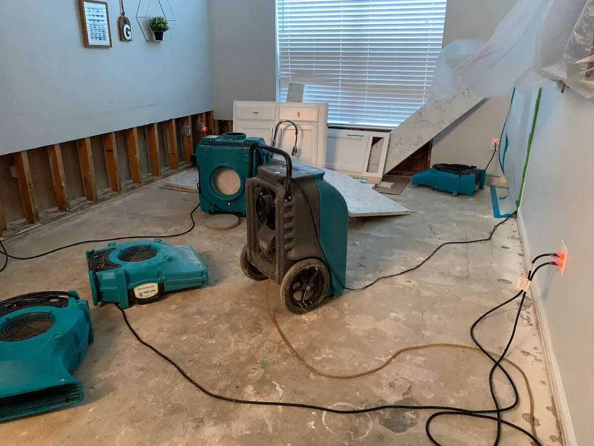 Dehumidifier in flood-cut room for Water Damage Restoration in Olney